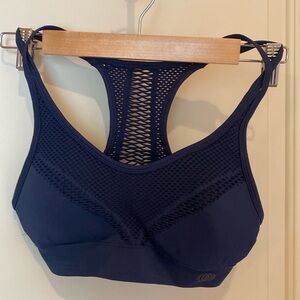 CALIA by Carrie Underwood navy sports bra.